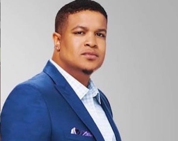 Michael Jamar posing for a picture.